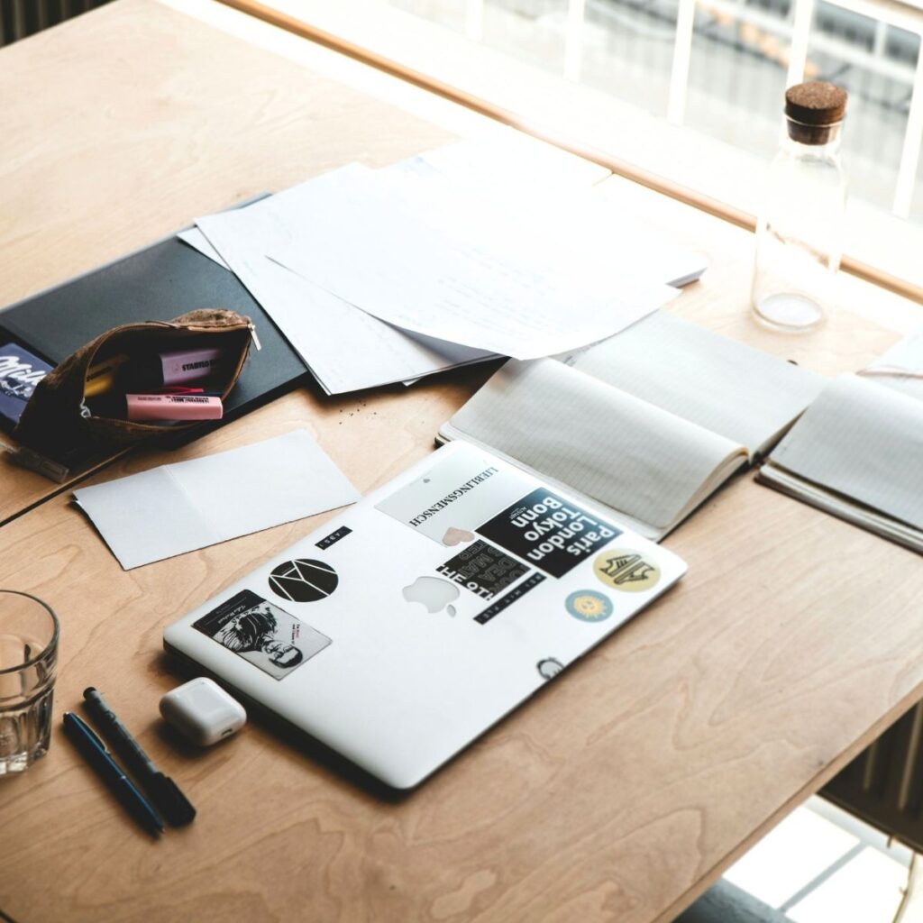 organized papers on a desk, clean and archived space.