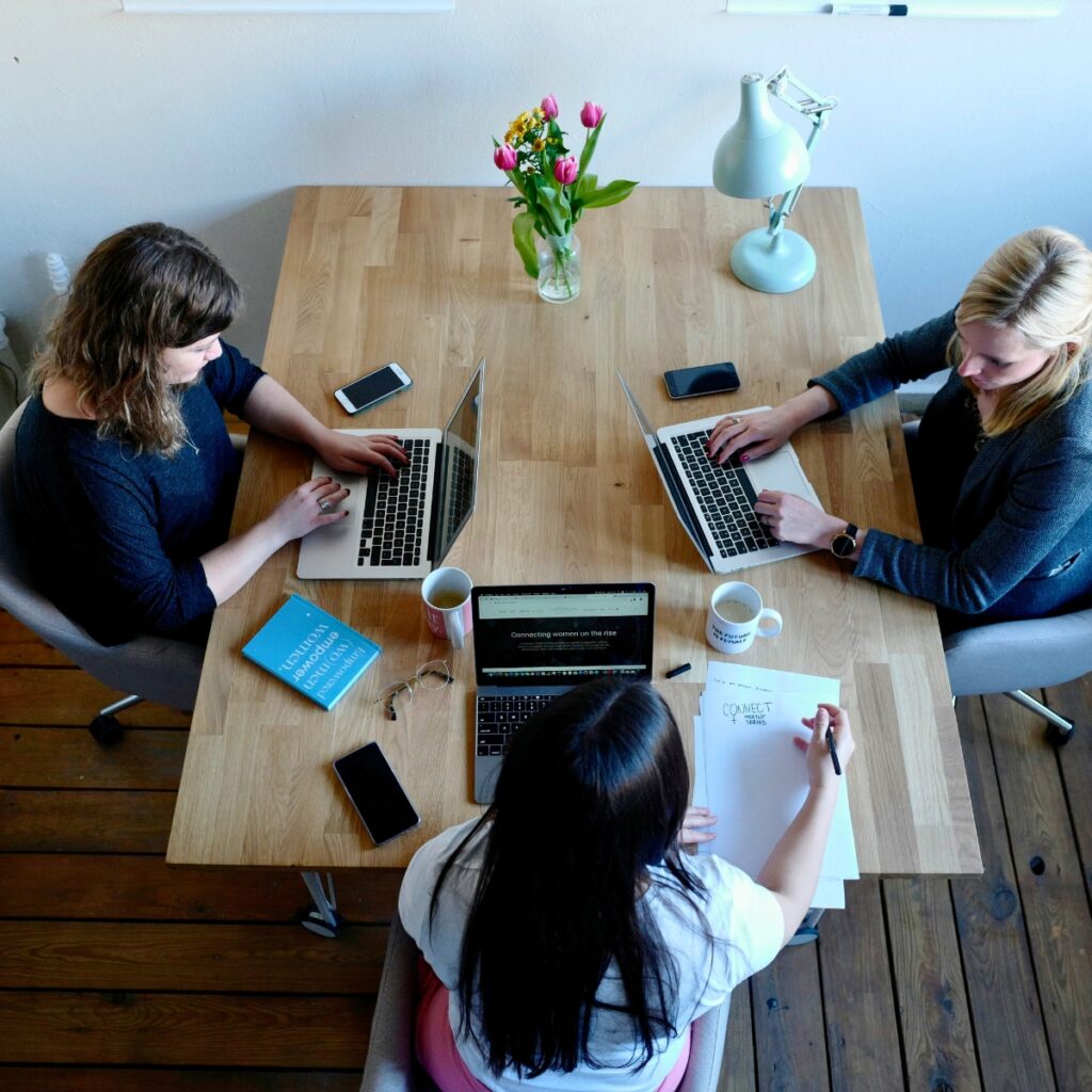 women_working_downloading_content_creators_organizing