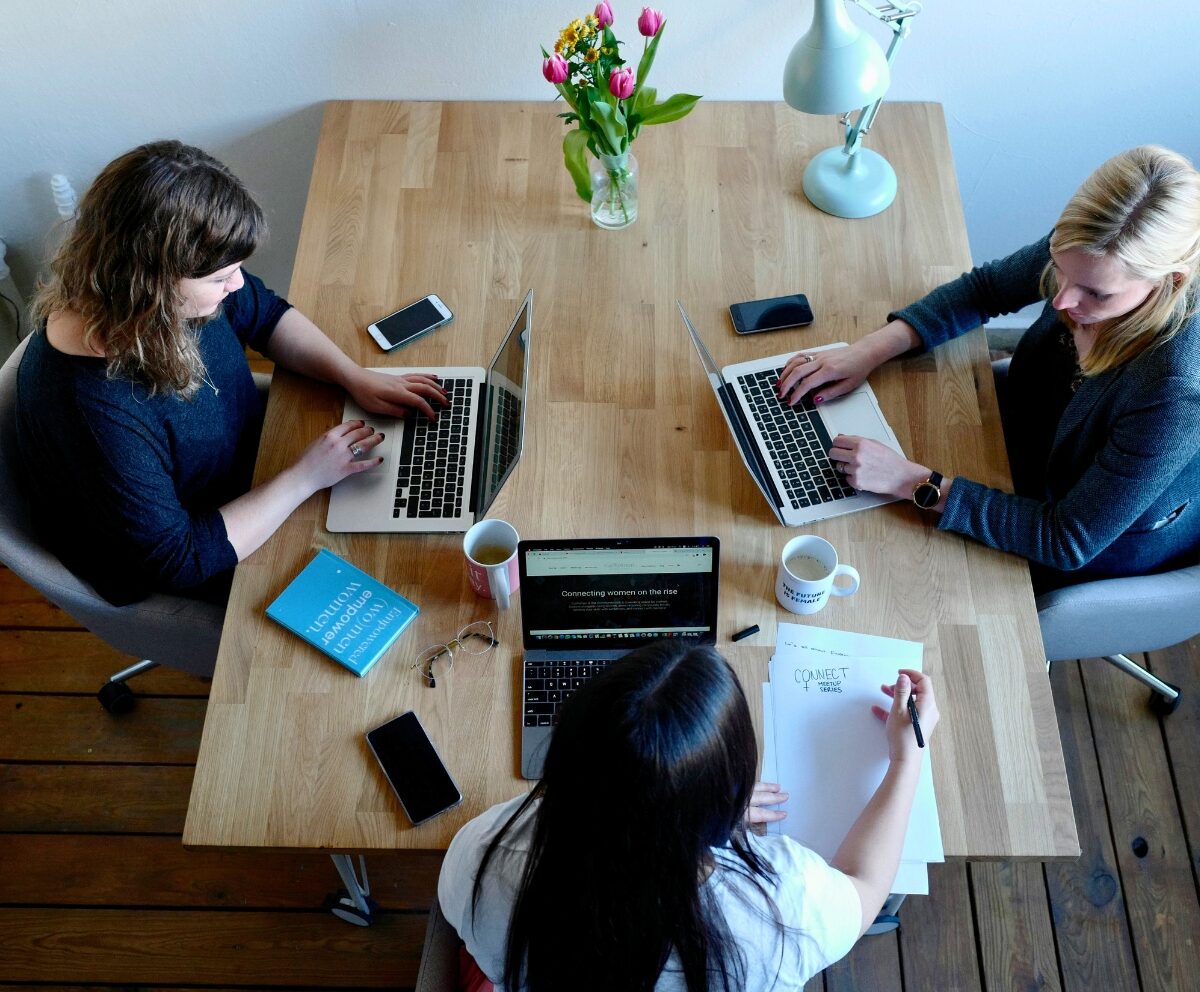 women_working_downloading_content_creators_organizing
